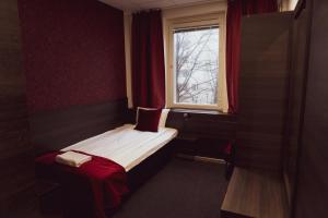 利耶赫門斯施塔特斯酒店房間的床