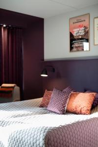 Letto o letti in una camera di Hotel Britannia