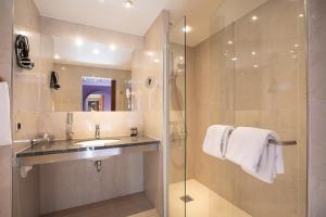 Ett badrum på Hotel Britannia