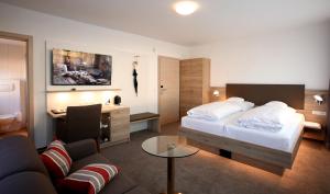 מיטה או מיטות בחדר ב-Hotel Warteck