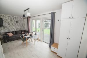 Posedenie v ubytovaní Zagroda Liliowa
