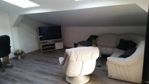 TV/Unterhaltungsangebot in der Unterkunft Ferienwohnung "Burgblick"