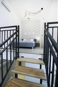 Łóżko lub łóżka w pokoju w obiekcie AbsyntApartments 24 Rynek Wrocław