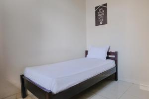 Katil atau katil-katil dalam bilik di OYO Life 2744 Guest House Qudsi