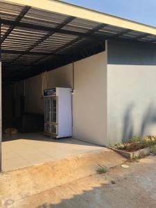 a refrigerator sitting inside of a building at BP cheap private rooms in Ko Mak