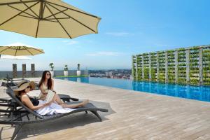 
The swimming pool at or near Novotel Suites Yogyakarta Malioboro, CHSE Certified and GeNose Ready

