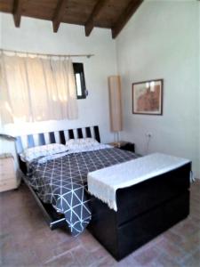Giường trong phòng chung tại Eva Recommends Caños de Meca Beach