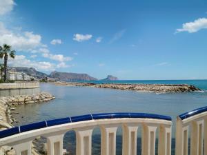 a bridge over a body of water next to the ocean at Apartment Albir by Interhome in Altea