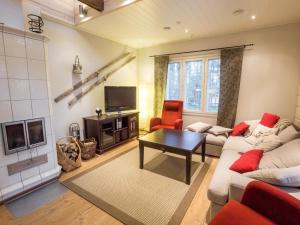 Et opholdsområde på Holiday Home Vanamotupa by Interhome + 15 billeder