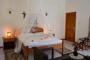 Ein Bett oder Betten in einem Zimmer der Unterkunft Zerof Guest House