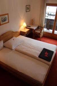 Katil atau katil-katil dalam bilik di Pension Feiersinger