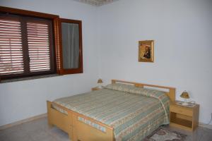Postel nebo postele na pokoji v ubytování Casa Magisa