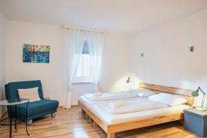 Postel nebo postele na pokoji v ubytování Gasthof Wastlwirt