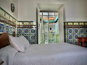 Posteľ alebo postele v izbe v ubytovaní Hostal Lis + 29 fotografií
