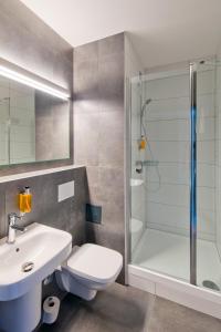 Kúpeľňa v ubytovaní o3Hotel