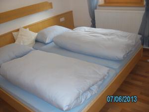 Una cama o camas en una habitación de Haus Znopp