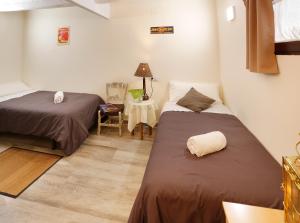 A bed or beds in a room at Cal Vibo