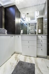 Kúpeľňa v ubytovaní ResiNest Apartamenty Nowe Bojary