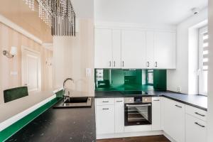 Kuchyňa alebo kuchynka v ubytovaní ResiNest Apartamenty Nowe Bojary