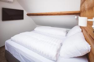 Postel nebo postele na pokoji v ubytování HDC Nivelles Grand-Place