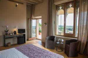 Postel nebo postele na pokoji v ubytování Hotel Mas Bosch 1526