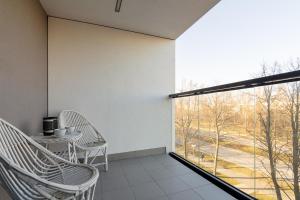 Balkón alebo terasa v ubytovaní Rozłogi Sunny Apartment