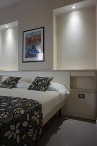 Postel nebo postele na pokoji v ubytování Hotel Imperiale & SPA
