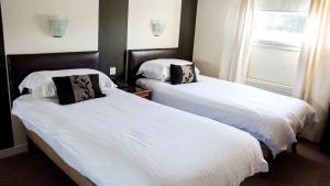 Postel nebo postele na pokoji v ubytování Avonbridge Hotel