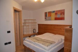 A bed or beds in a room at Residence Ca' Delle Margherite
