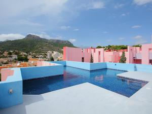 Bazén v ubytovaní Studio Muralla Roja-3 by Interhome alebo v jeho blízkosti