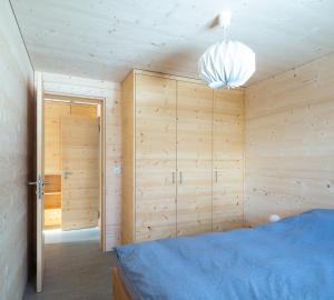 Postel nebo postele na pokoji v ubytování Labbrunnu OG in den Walliser Alpen