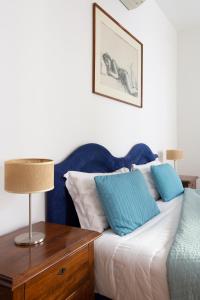 A bed or beds in a room at Ca degli Angeli