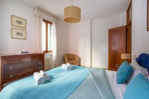 A bed or beds in a room at Ca degli Angeli