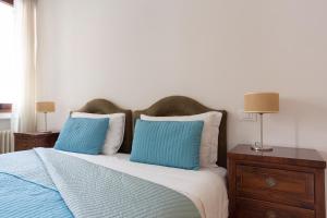 A bed or beds in a room at Ca degli Angeli