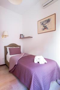 A bed or beds in a room at Ca degli Angeli