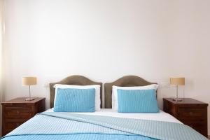 A bed or beds in a room at Ca degli Angeli