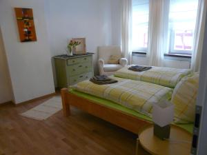 Postel nebo postele na pokoji v ubytování Ferienwohnung Bernhard