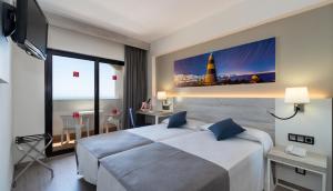 Postel nebo postele na pokoji v ubytování Medplaya Hotel Bali