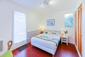 Cama o camas de una habitación en Appart'Hôtel Bellevue