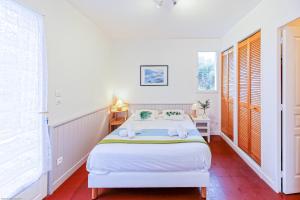 Cama o camas de una habitación en Appart'Hôtel Bellevue