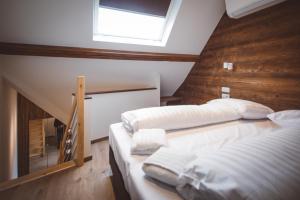 Postel nebo postele na pokoji v ubytování HDC Nivelles Grand-Place