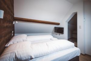 Postel nebo postele na pokoji v ubytování HDC Nivelles Grand-Place