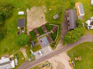 an overhead view of a yard with houses and a road at North Coast 500 Pods in Achmelvich