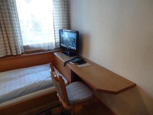 TV a/nebo společenská místnost v ubytování Hotel Peter