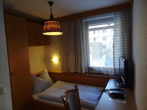 Ліжко або ліжка в номері Hotel Peter