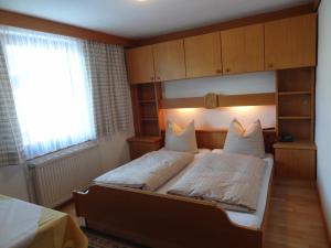 Ліжко або ліжка в номері Hotel Peter