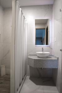 Ванная комната в Hotel Roble