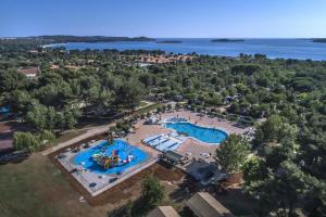 an aerial view of a resort with two pools at Lux camp - mobile homes in Bi village in Fažana