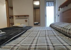 Katil atau katil-katil dalam bilik di Casa di Zia Lilia