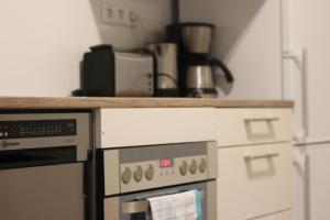 Kuchnia lub aneks kuchenny w obiekcie Rentaroom-Kassel Appartement B4